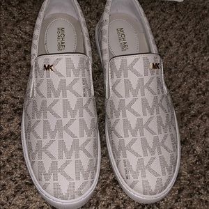 MK slipons PRICE FIRM. LOWBALLERS WILL BE BLOCKED